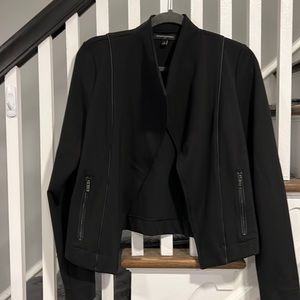 Black blazer with piping and zippered pockets
